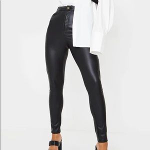 Skinny leg leather pants with button